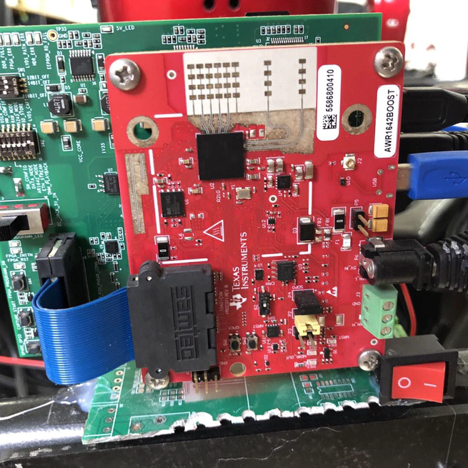 A Cluster-Based Weighted Feature Similarity Moving Target Tracking Algorithm for Automotive FMCW Radar